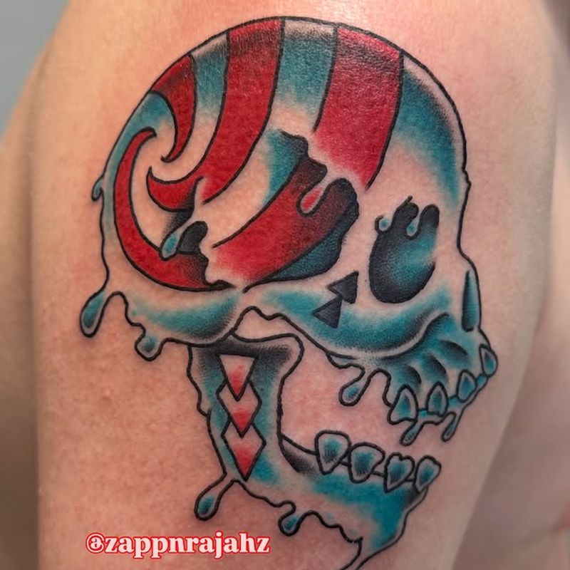 American traditional skull and flame tattoo by Tomo