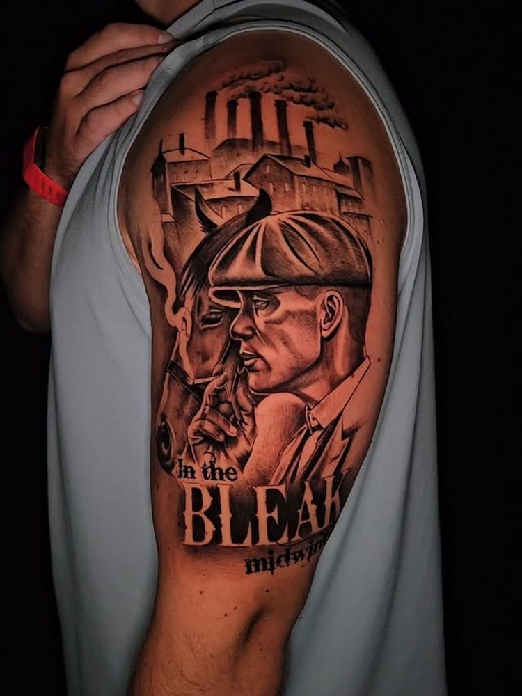 Black and grey Peaky Blinders portrait tattoo by Sergio