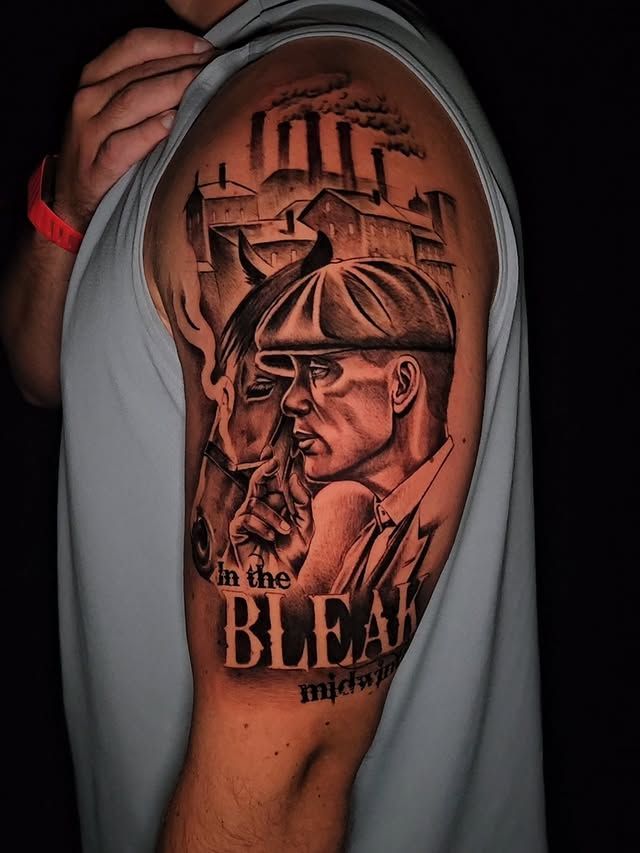 Black and grey Peaky Blinders portrait tattoo by Sergio