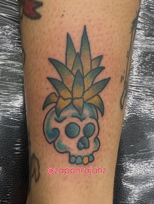 Color pineapple skull tattoo by Tomo