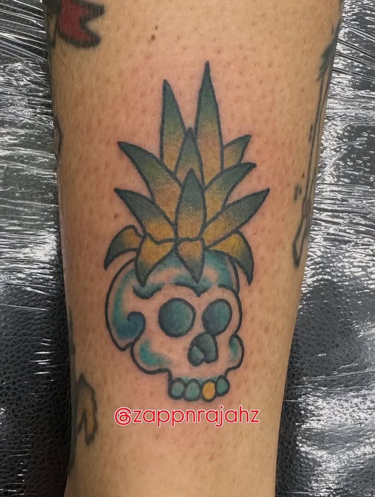 Color pineapple skull tattoo by Tomo