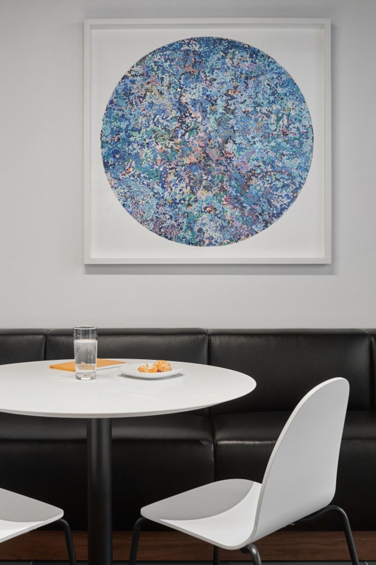 Detail of artwork and banquette seating