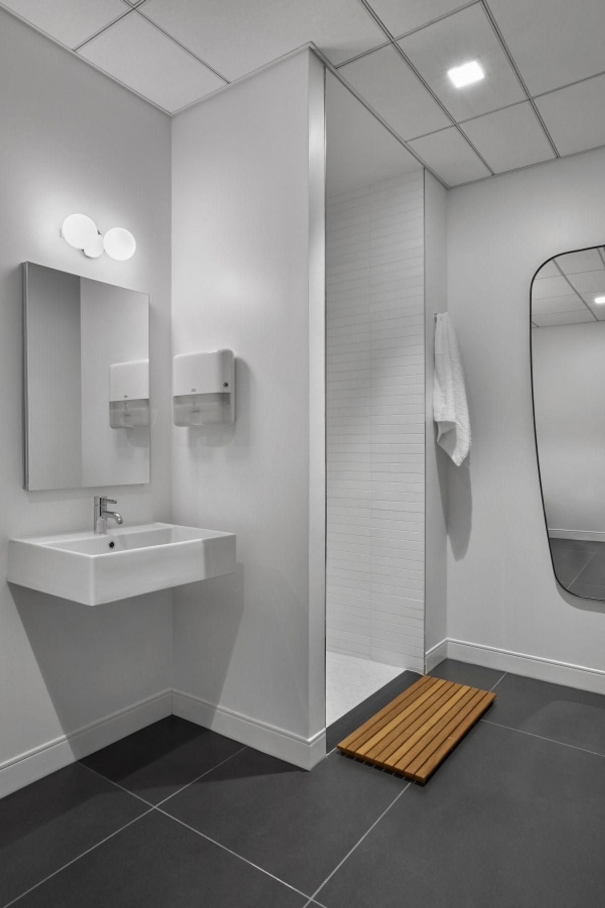 Sleek, white shower room