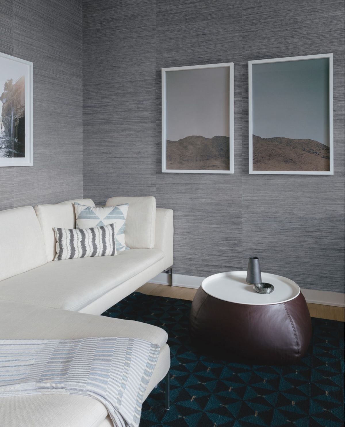 Detail of additional seating area with white sofa
