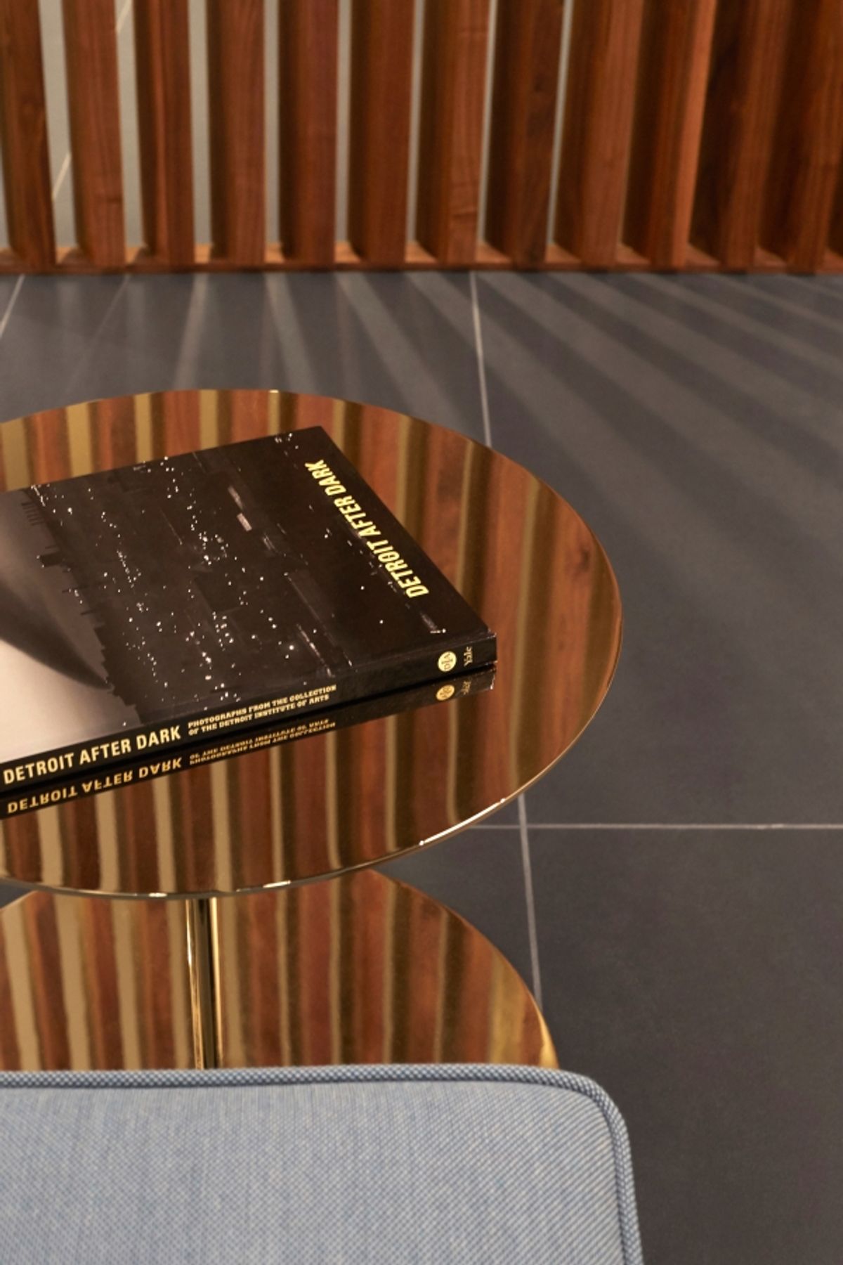 Detail of mirrored side table in reception area