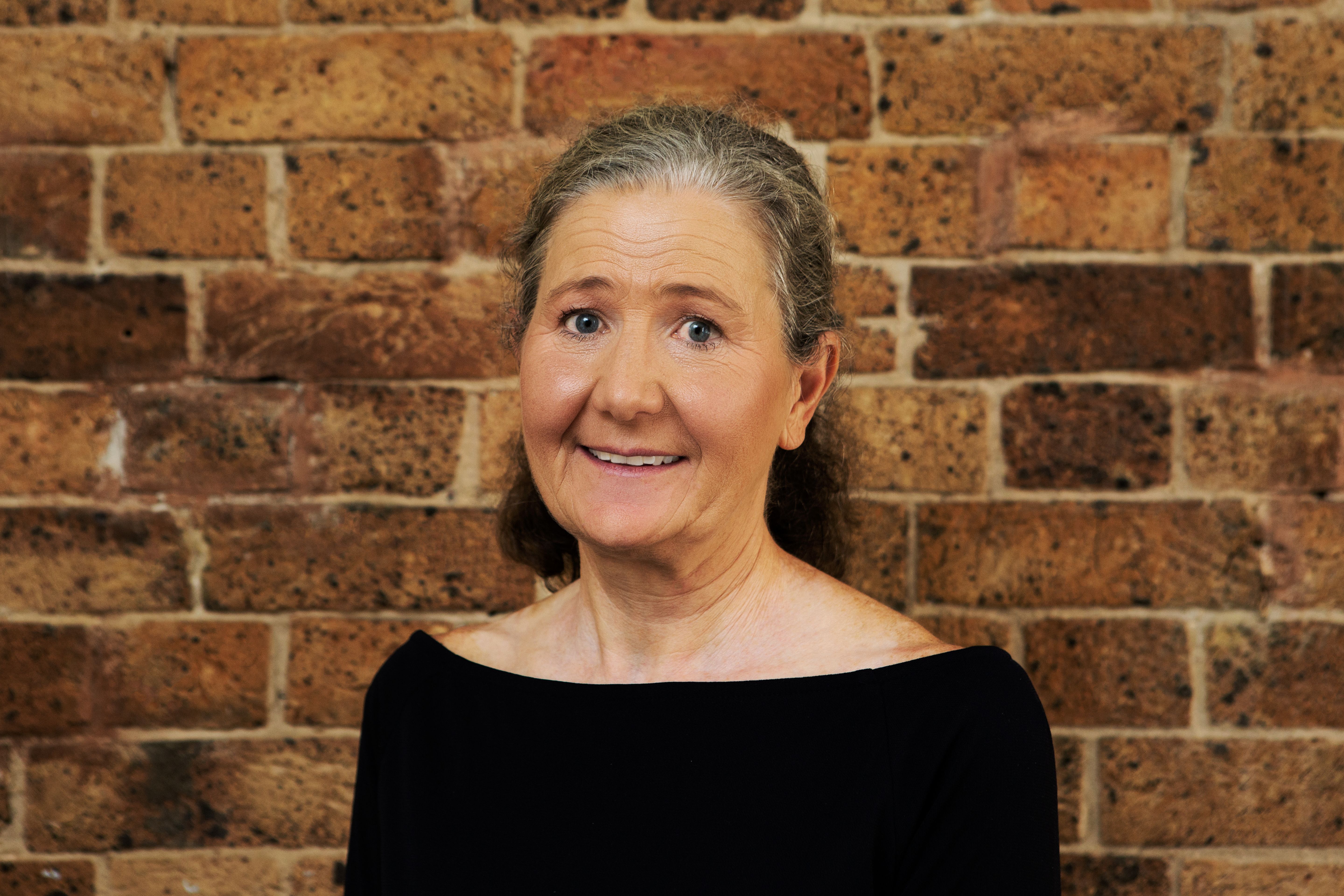 Household Capital Pension Boost Specialist Helen Cracknell smiles to camera