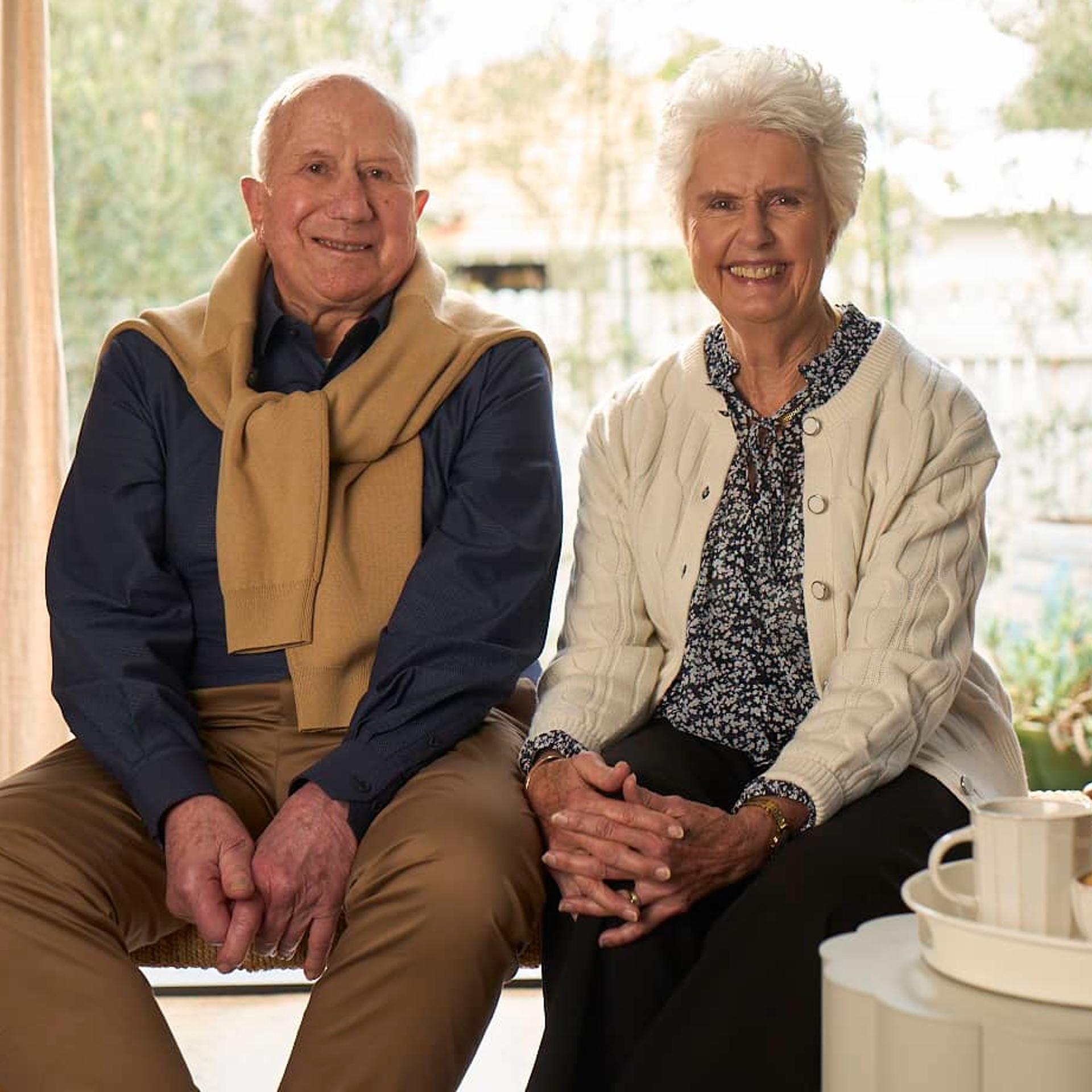 Two people speaking to camera