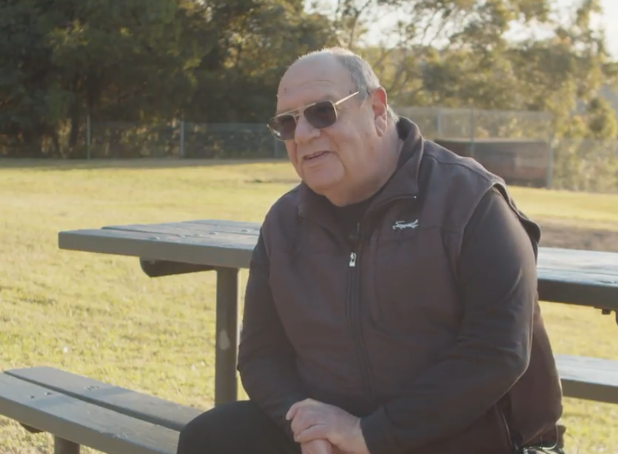 Household Capital Customer Barry sitting on a picnic chair outside