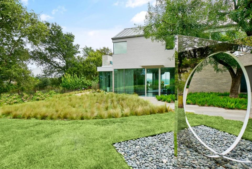 Modern residence with native landscaping and a garden sculpture