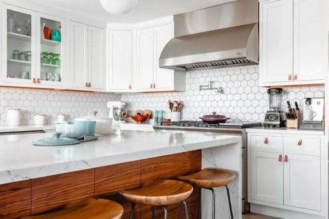 Remodeled kitchen with island and custom cabinetry