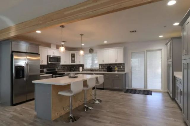 modern farmhouse kitchen with wood beam