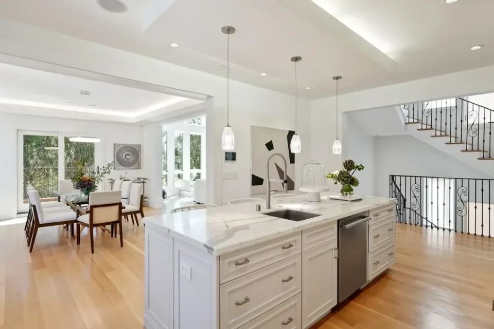 Finished open living space by Pinnacle Construction