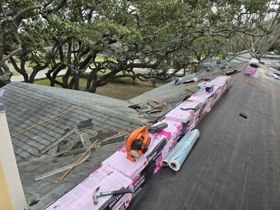Residential shingle-roof replacement in progress
