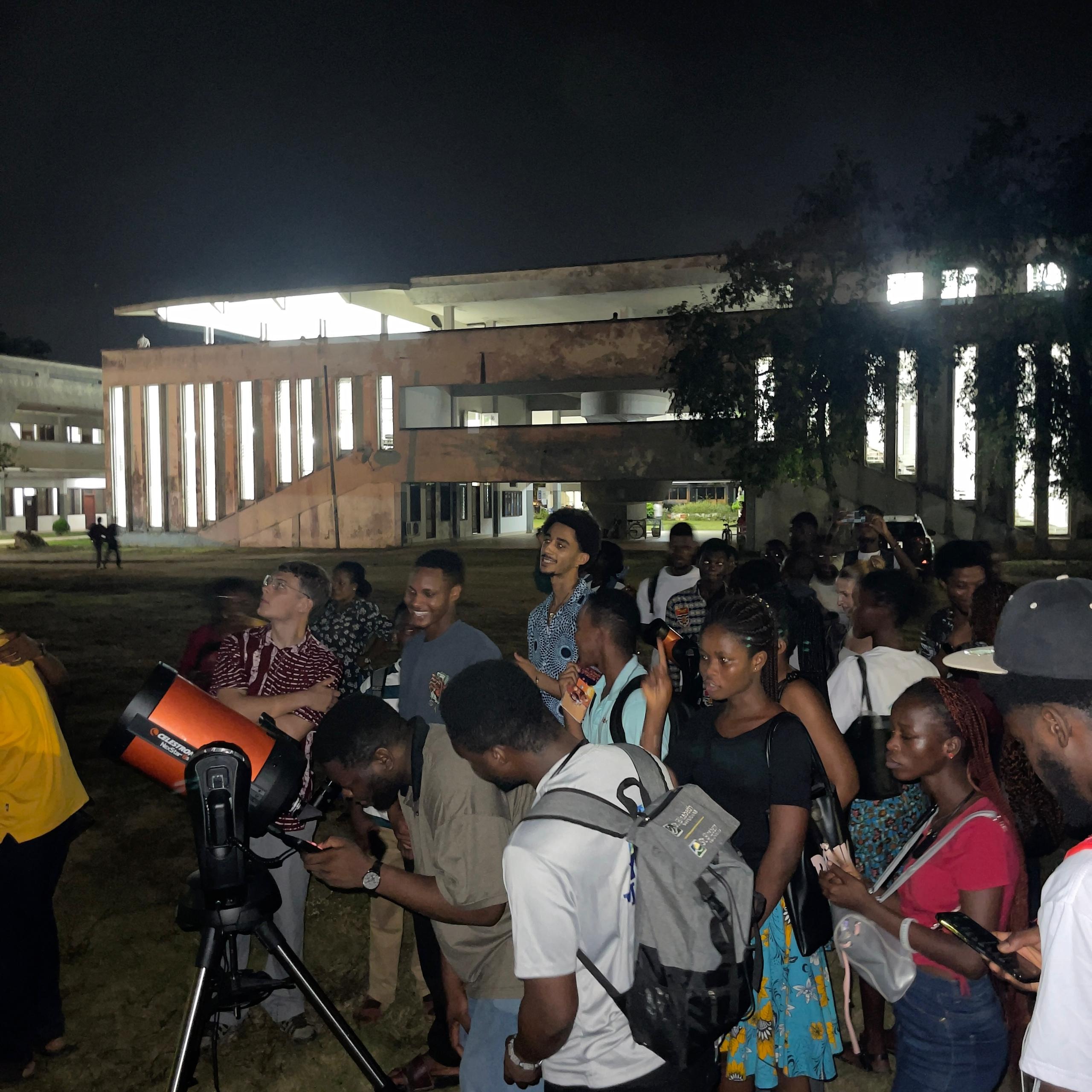 An evening stargazing session draws a crowd at the University of Ghana.