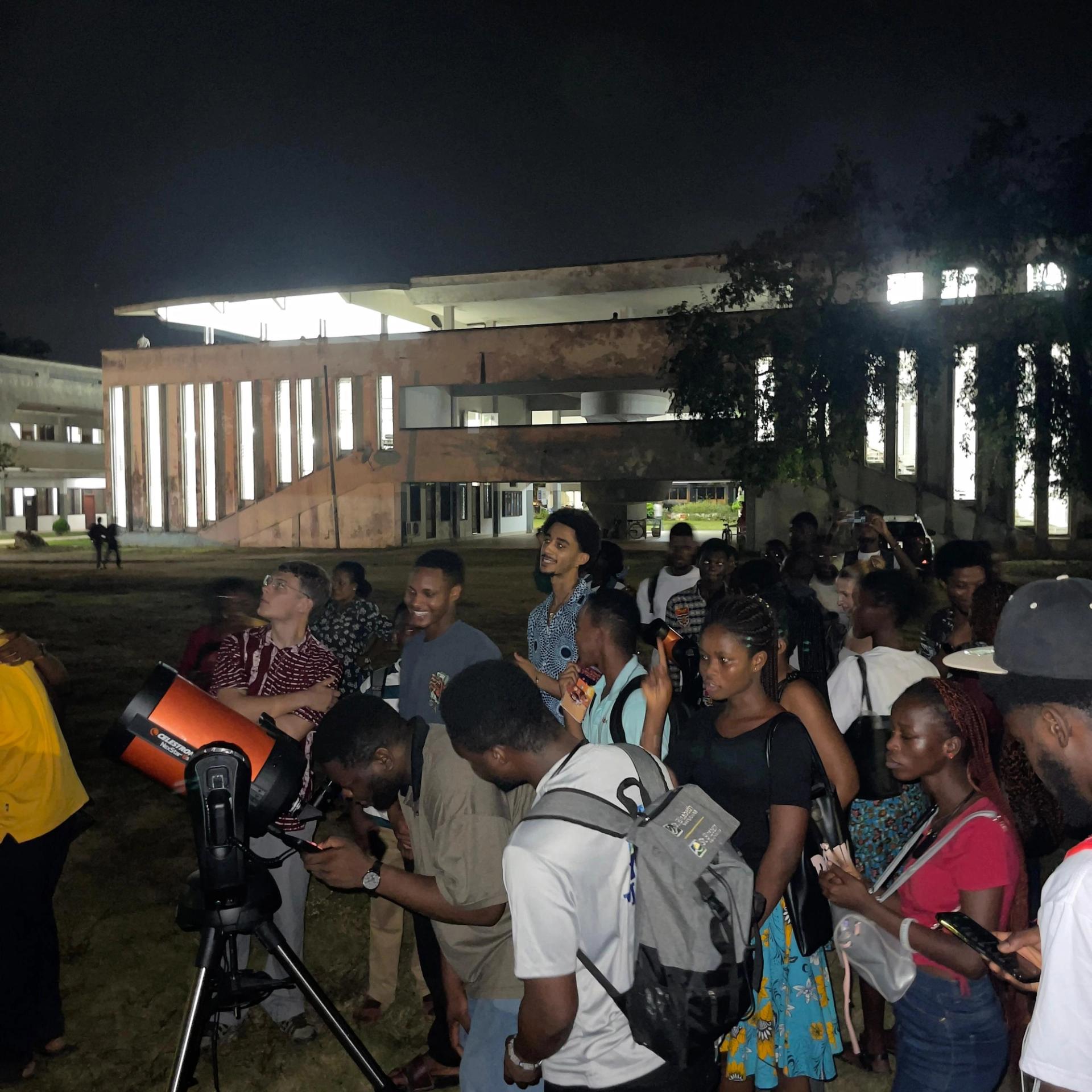 An evening stargazing session draws a crowd at the University of Ghana.
