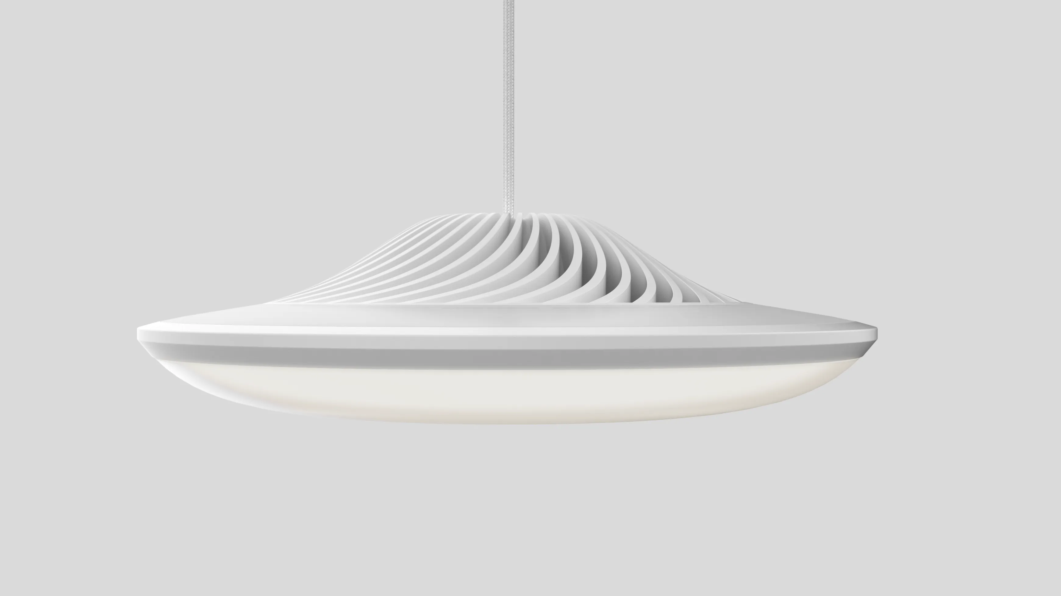 A sideview  of the Luke Roberts smart pendant light with the bottom light shining