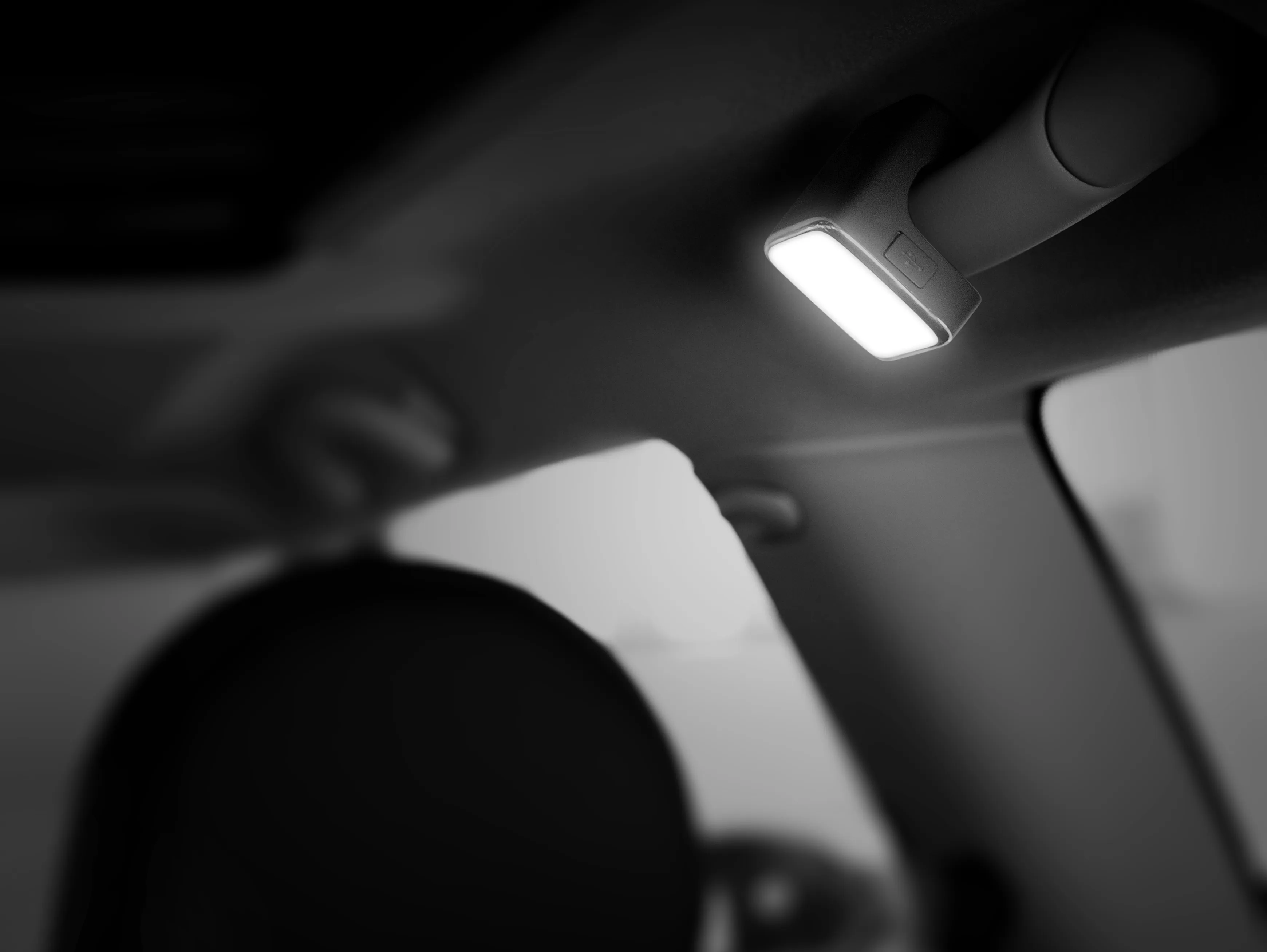 An osram LED lamp on a car handle