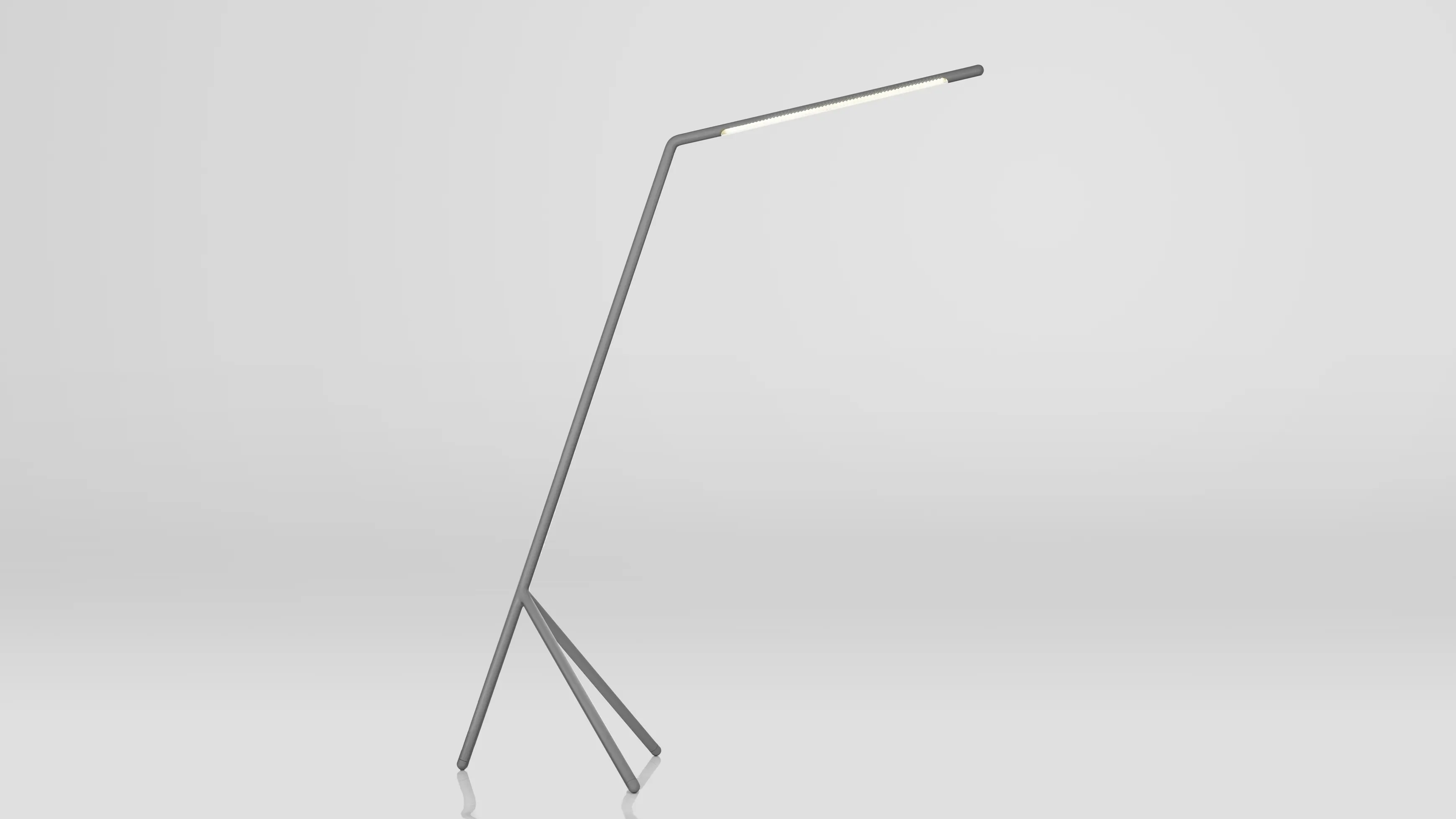 A grey steel tube LED floor lamp on a grey bacckground