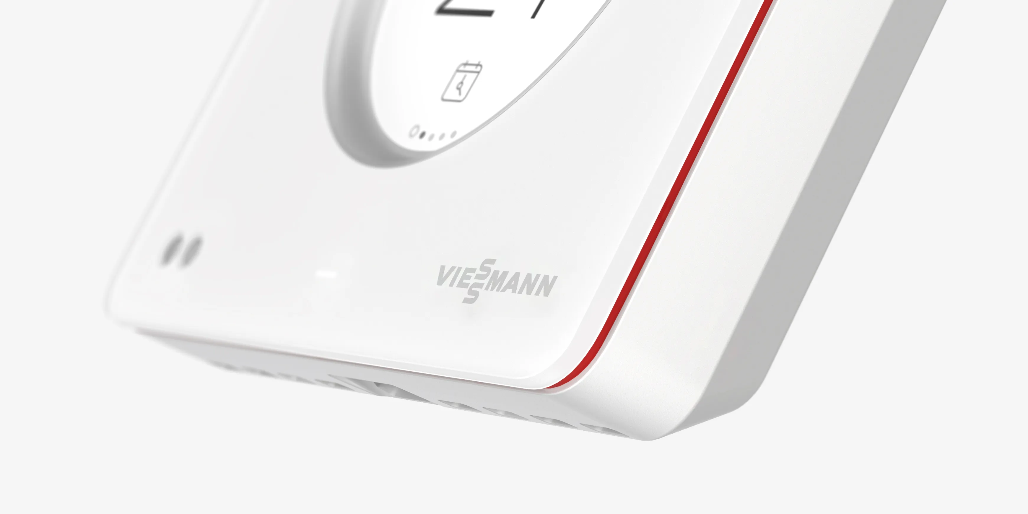 A detail shot of the Viessmann ViCare smart heating thermostat floating