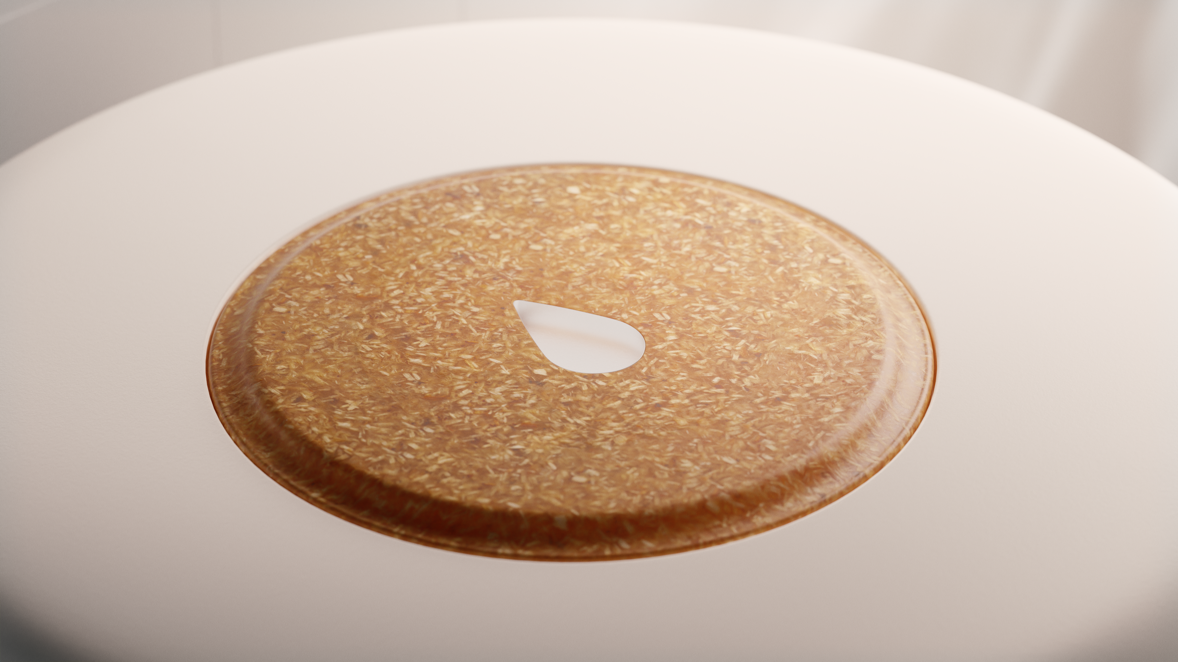 A button of the Mitte water purifier made of sustainable plastic