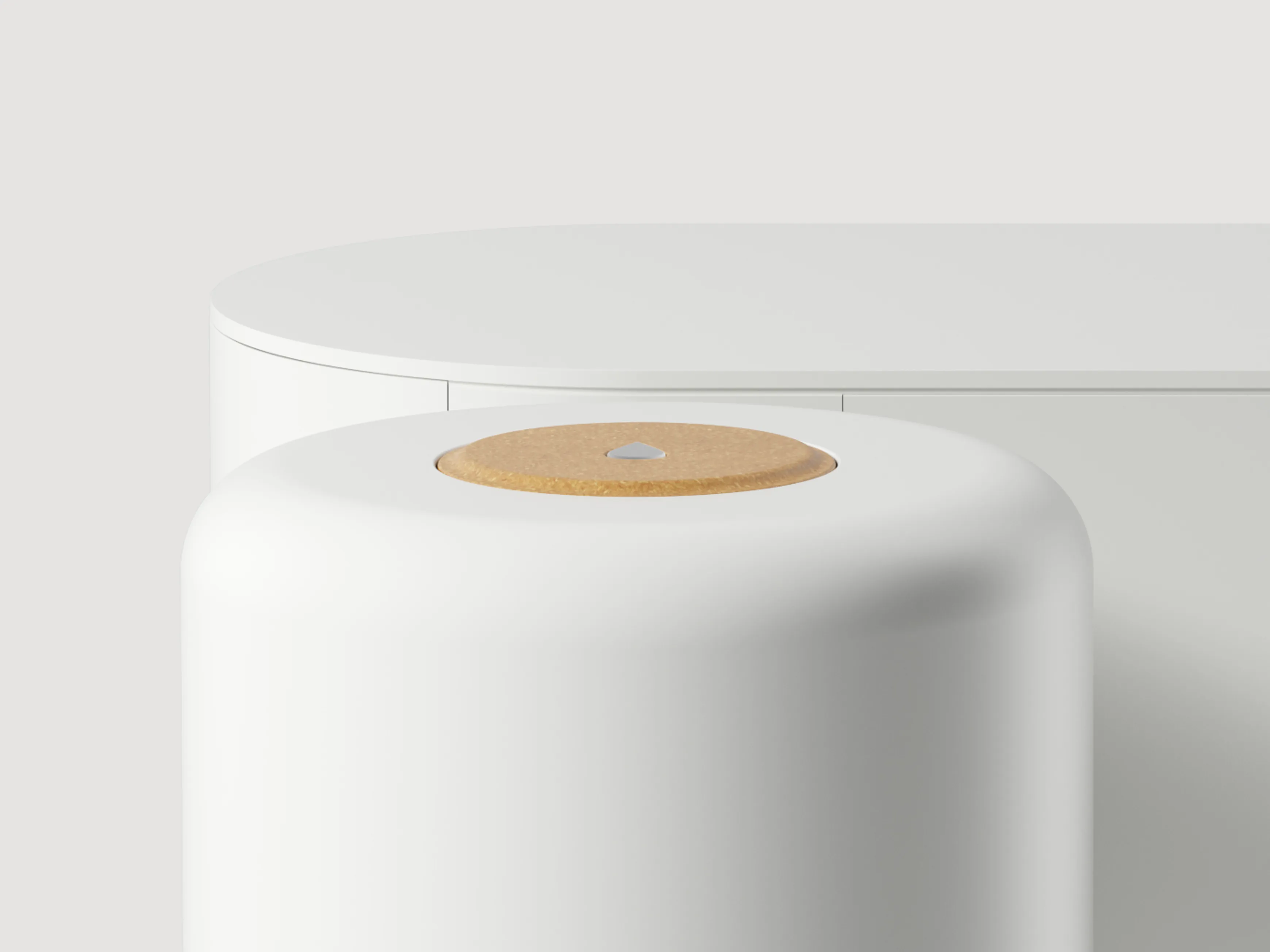 A detail of the Mitte water purifier showing its button made of sustainable plastic