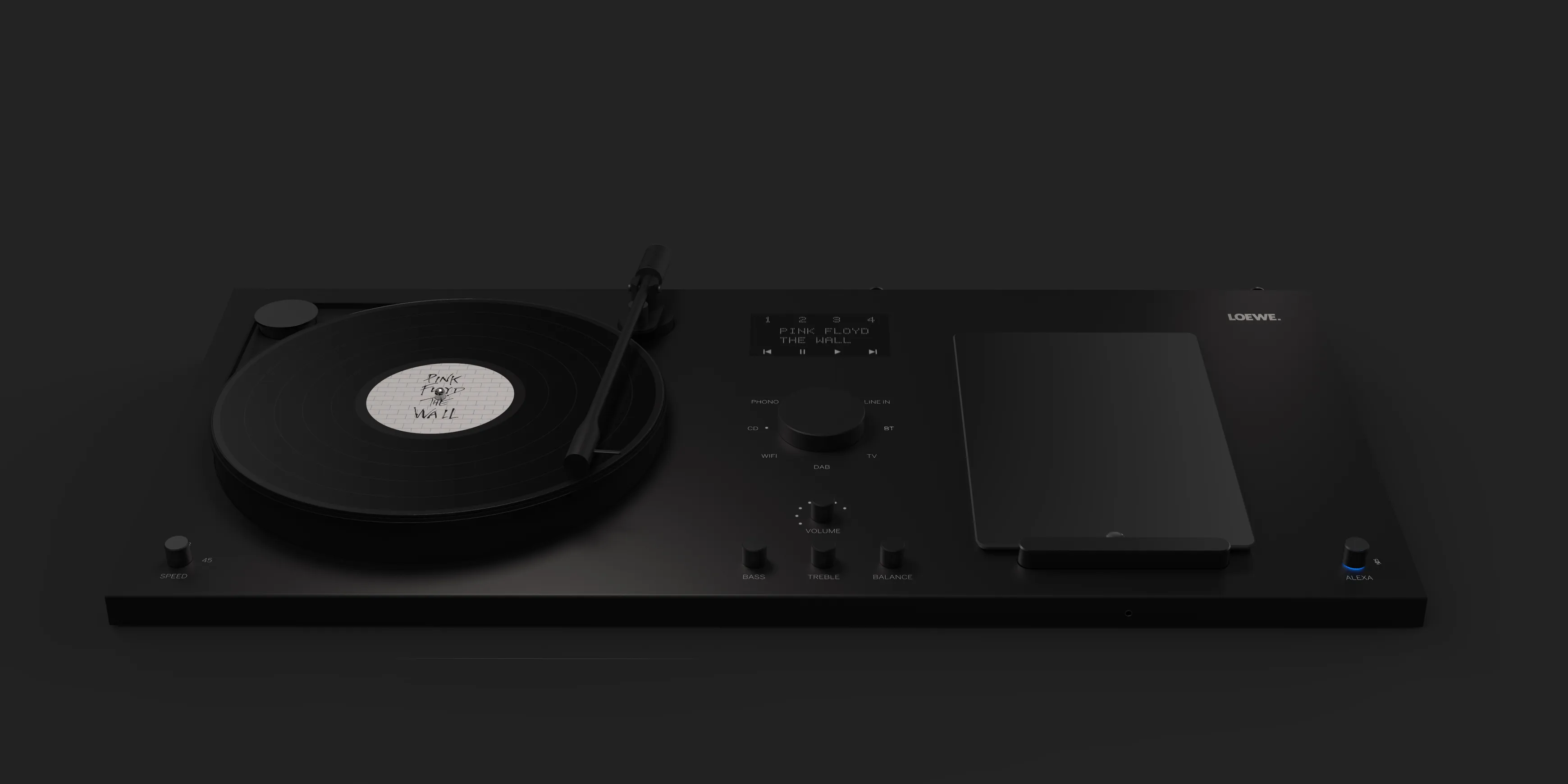 A Loewe music player with vinyl player and tablet in front of a black background