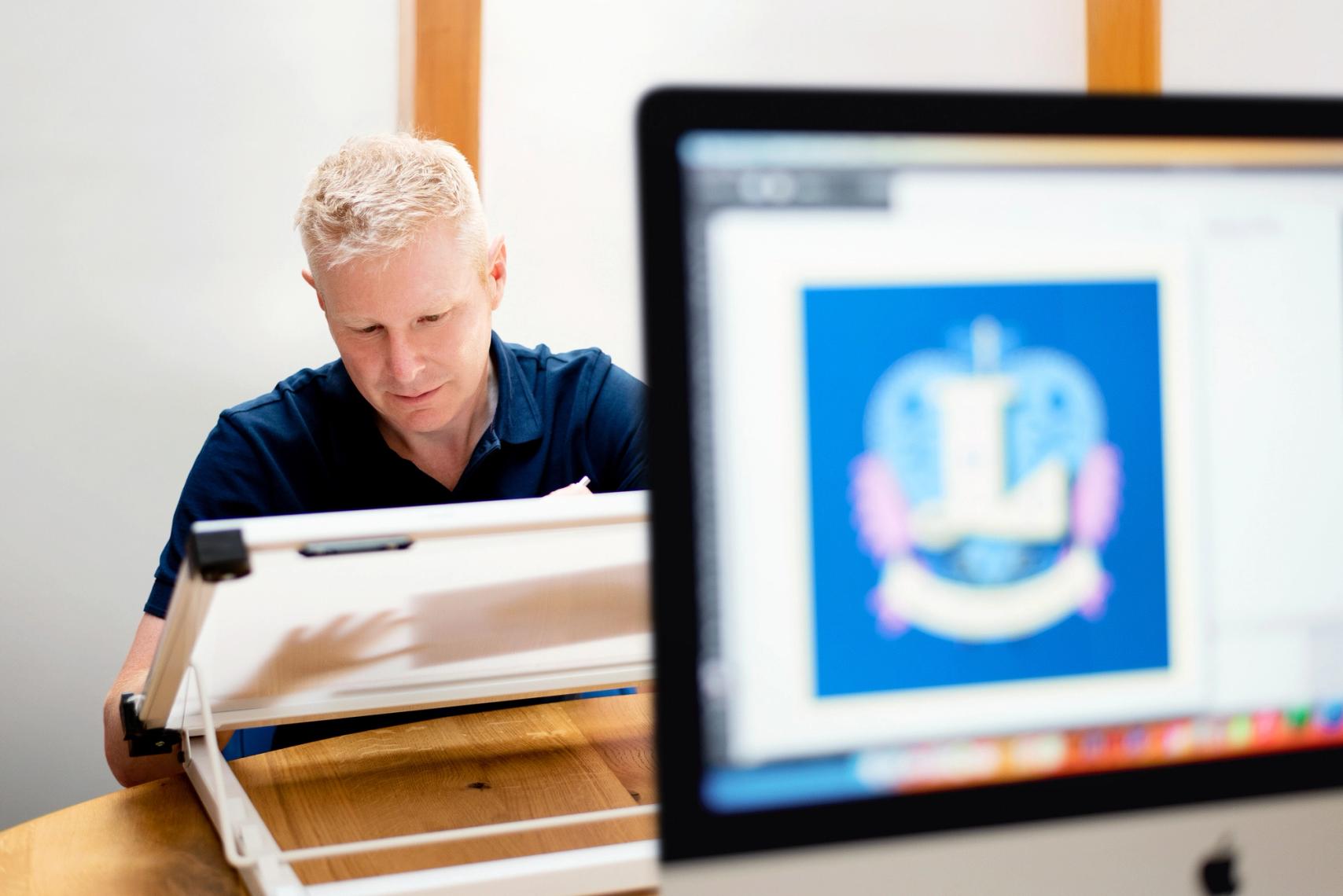 Jamie Clarke in his studio drawing