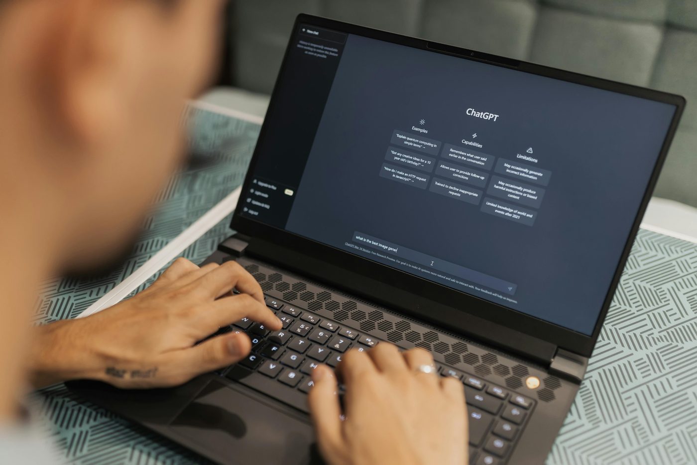 Image showing a man using ChatGPT.