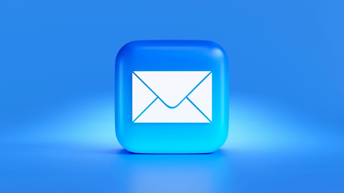 Mail app icon on a blue background.