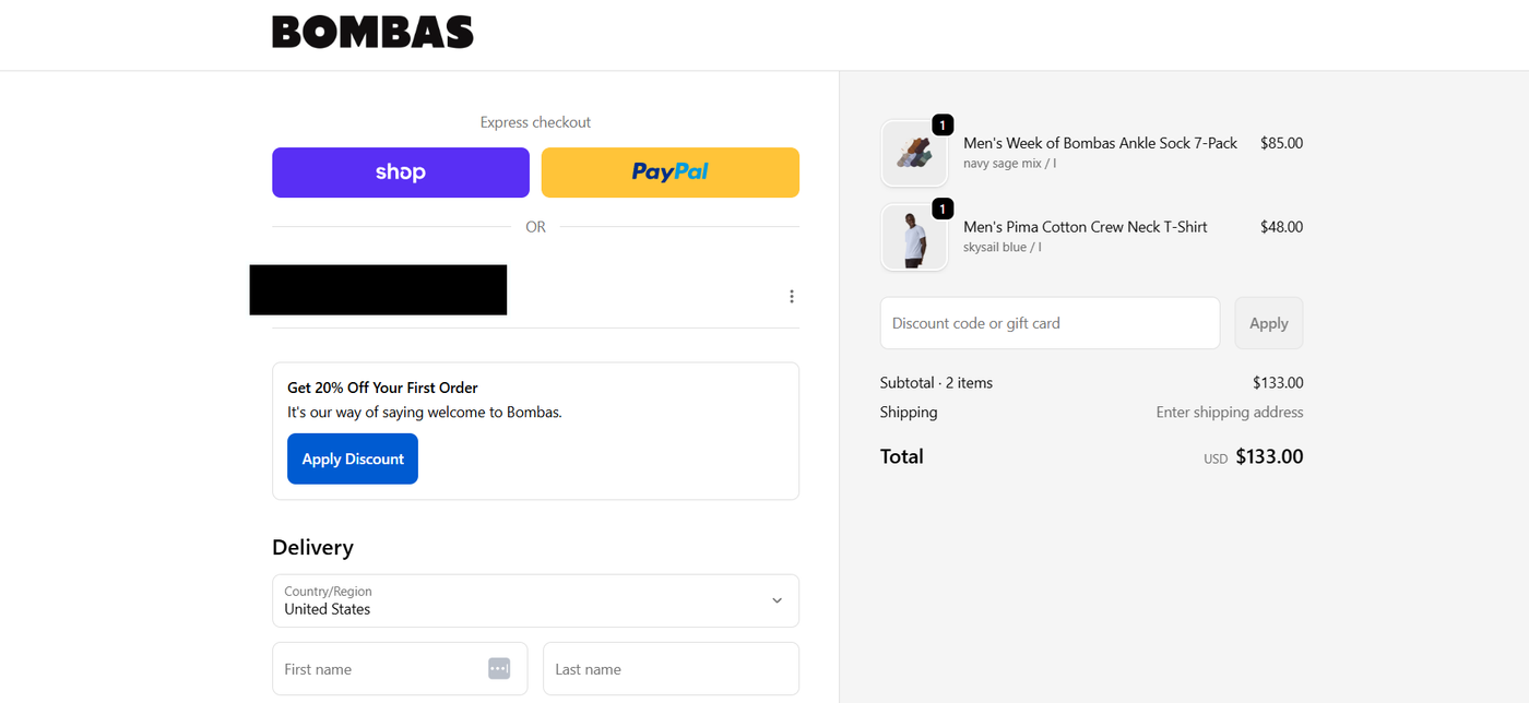 Screenshot of a Shopify store checkout page showing cart summary and payment fields.