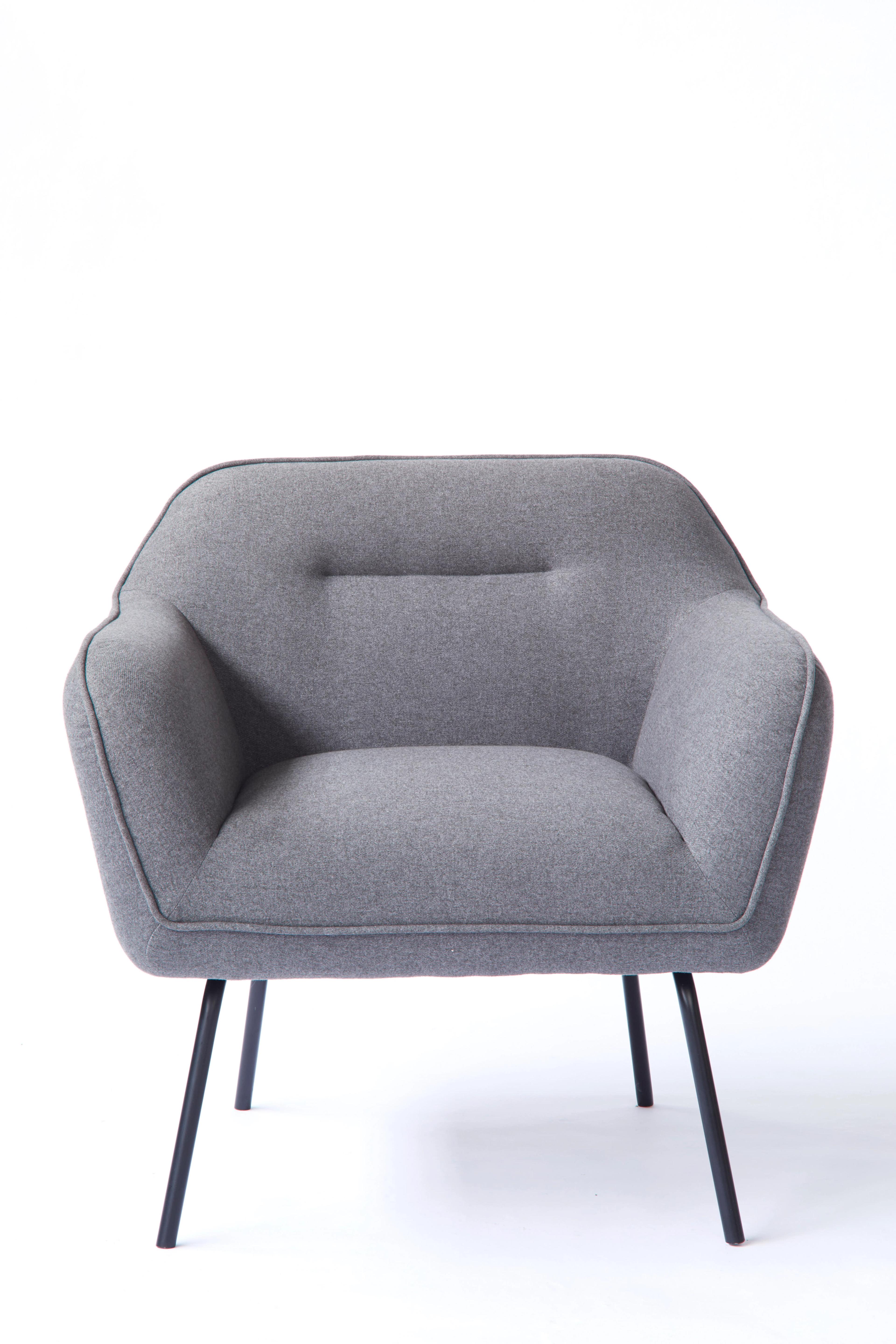 grey upholstered accent chair with metal legs