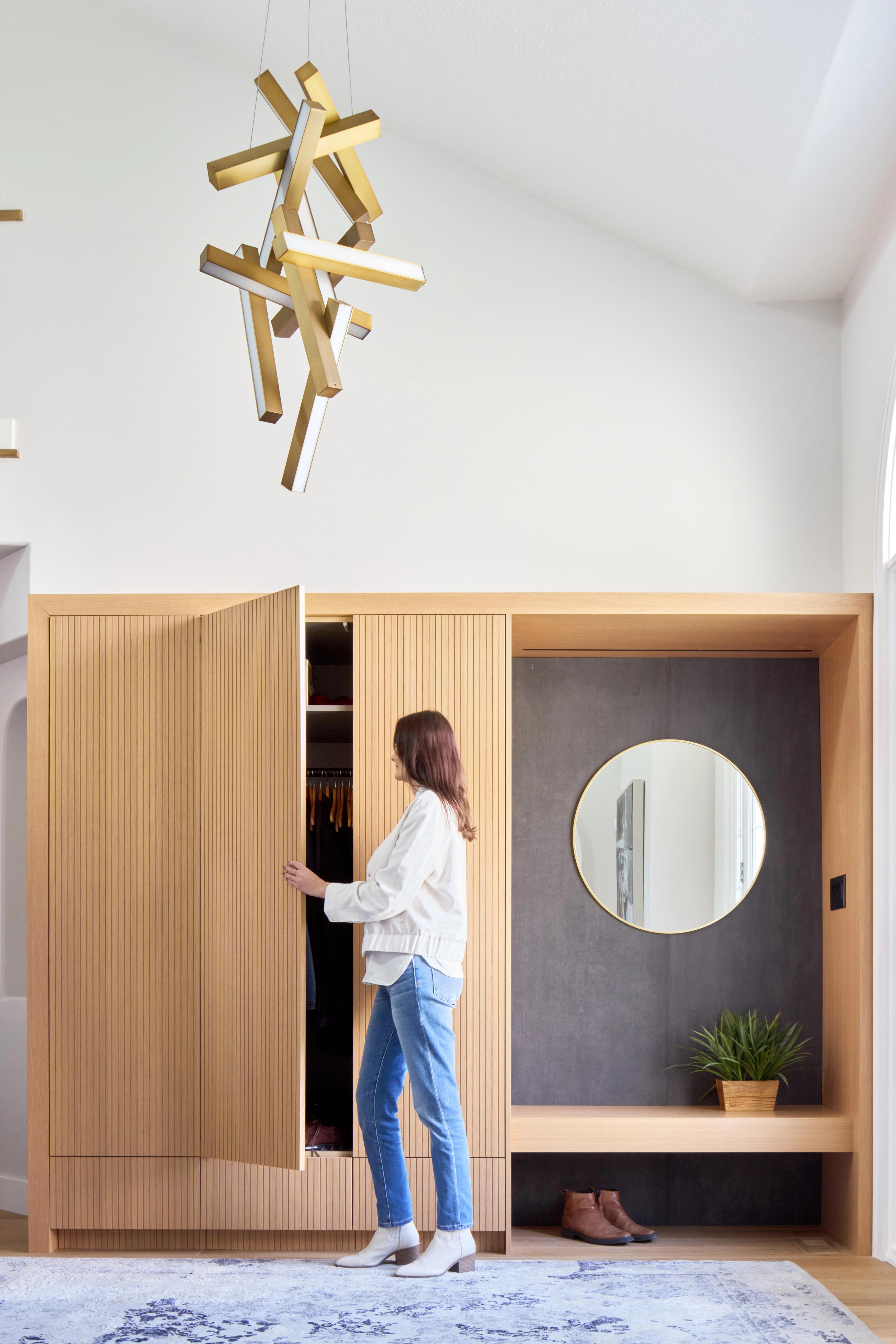 Hall closet with stunning light fixture
