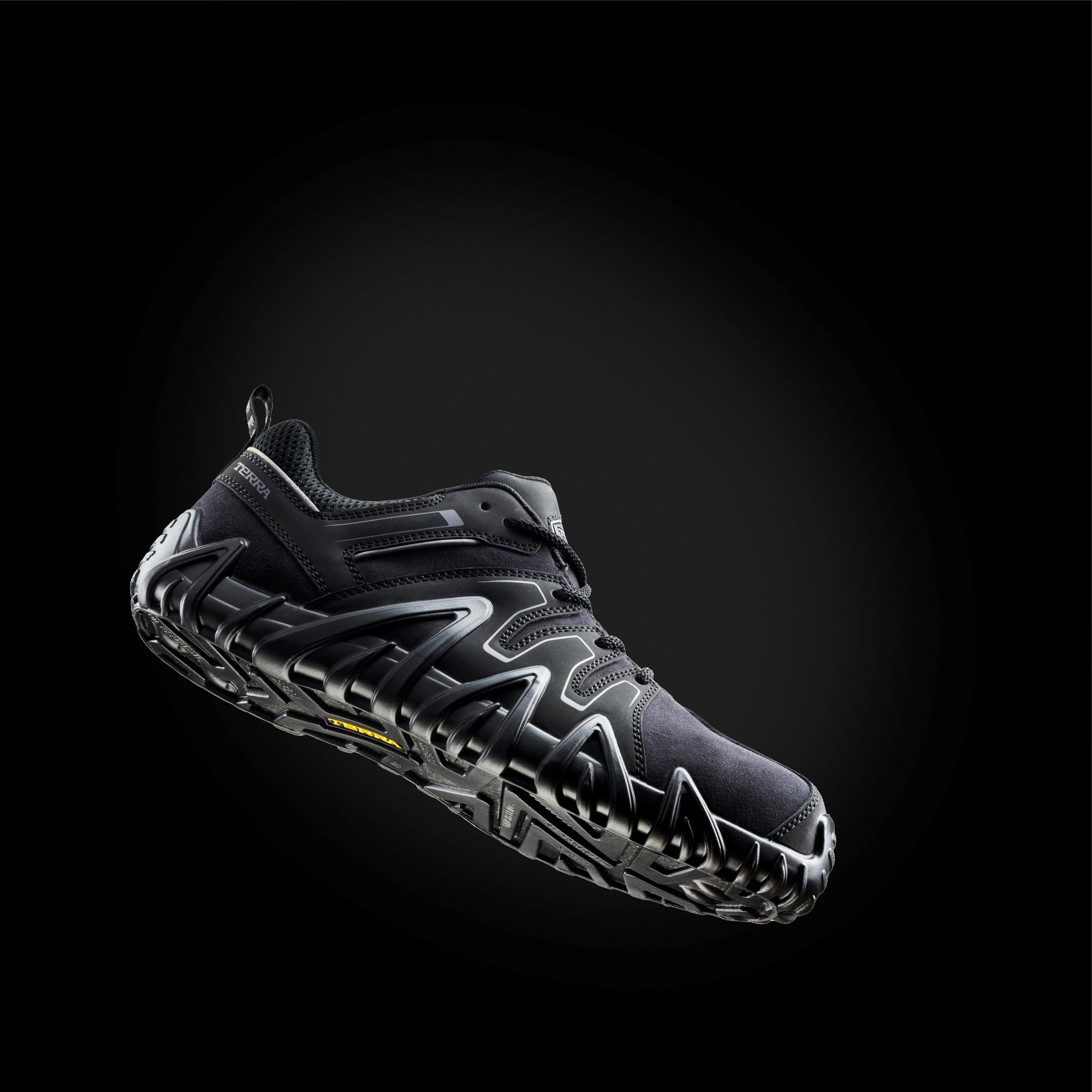 black safety shoe three quarter view dark background
