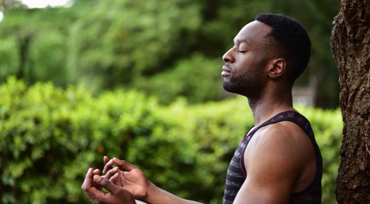 a man meditating