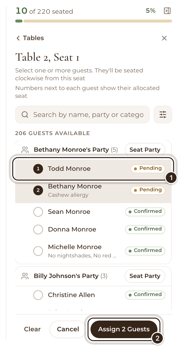 The seat picker for Table 2, Seat 1 with two guests ticked, Todd Monroe marked, and the Assign 2 Guests button marked