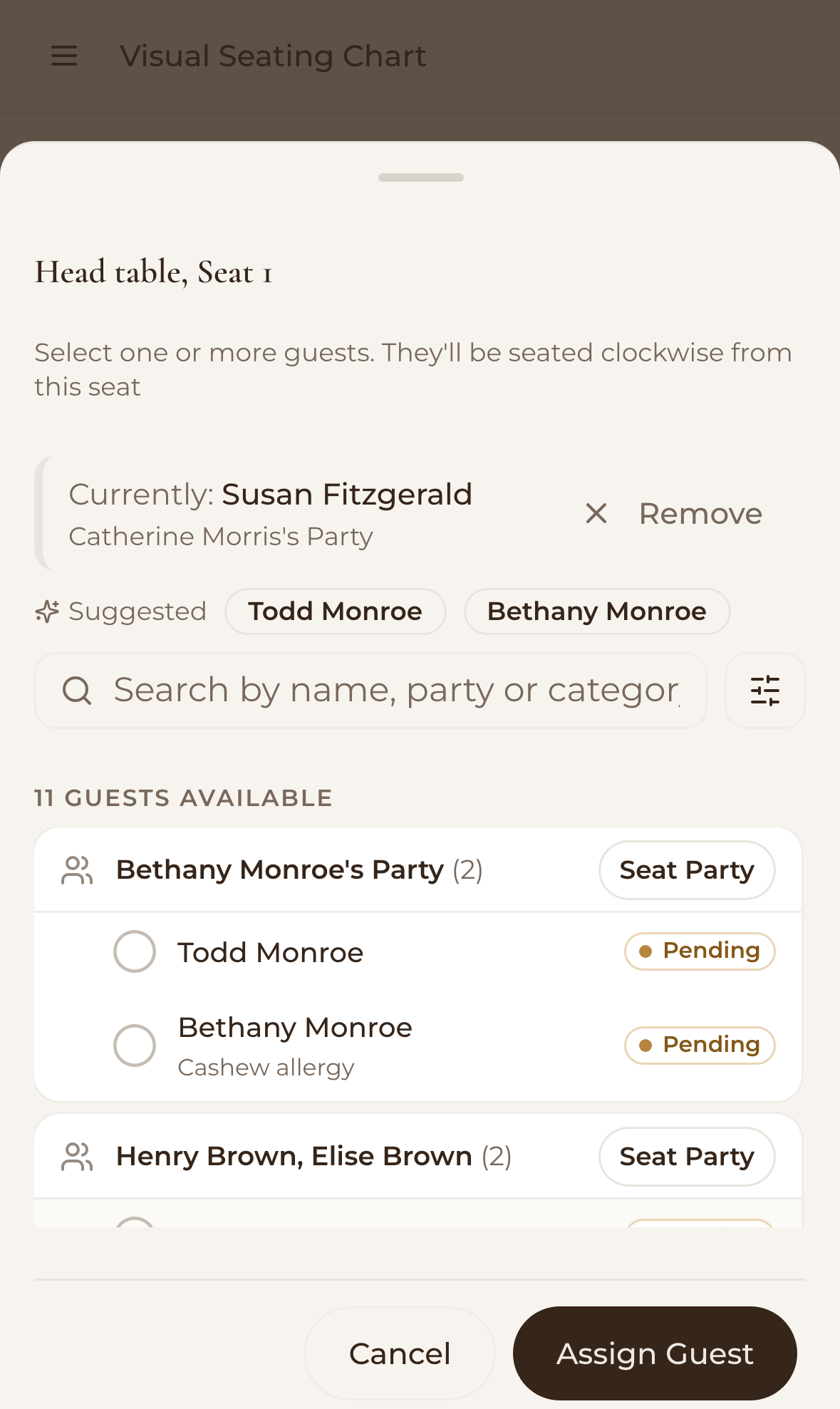 The seat picker on a phone for Head table, Seat 1, showing the guest in it now and the guests to choose from