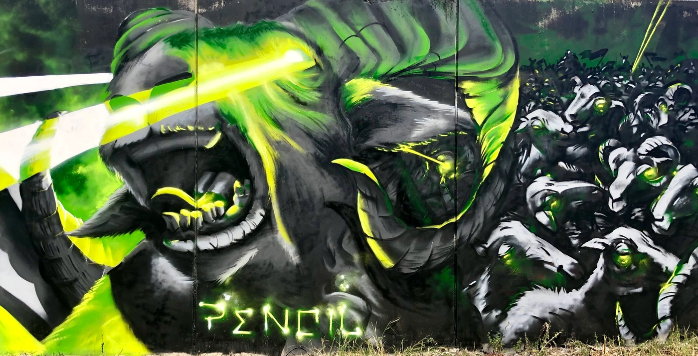 Horden av lasergetter drabbar samman med öns invånare, spraymålat på en lång vägg i Visby. Laser goat horde clashing with the island's inhabitants, spray-painted on a long wall in Visby.