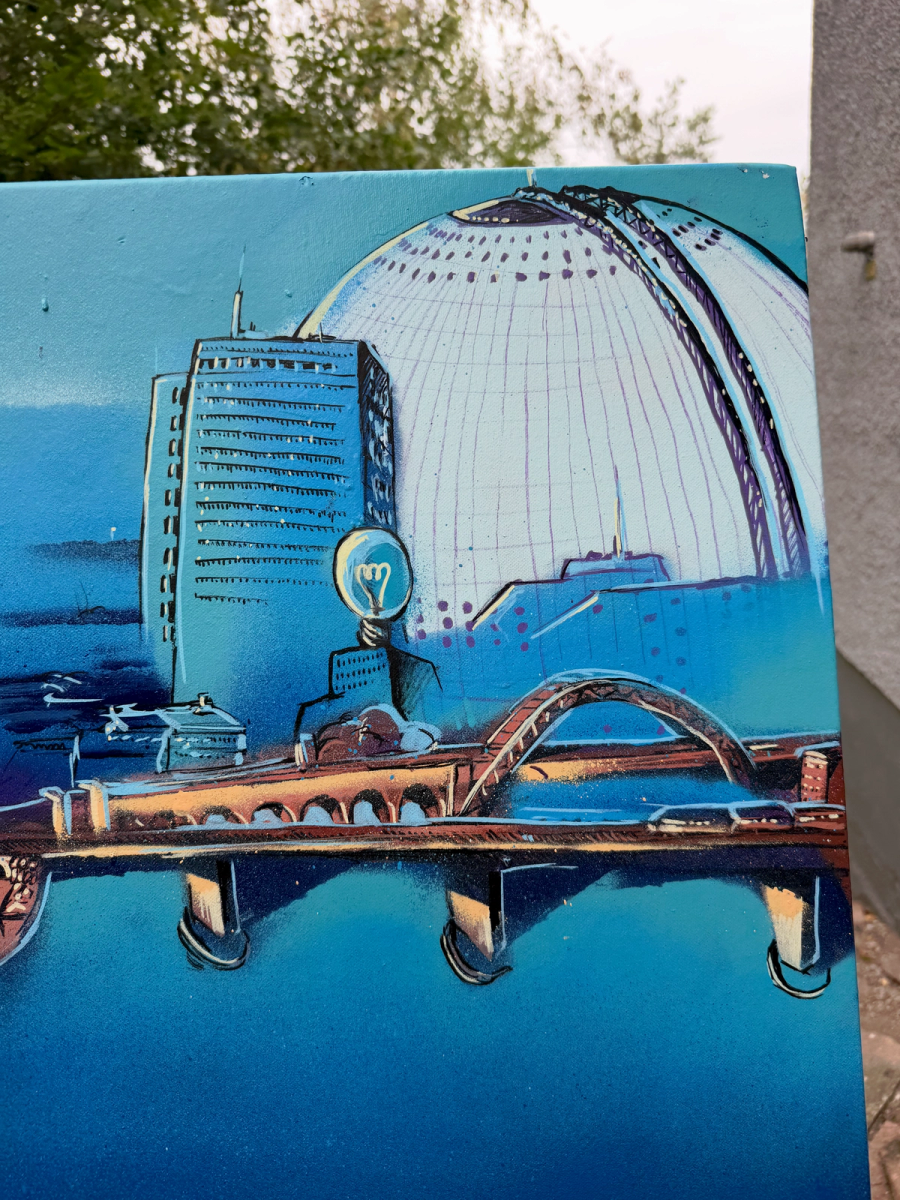 Globen och en bro målade i kanten av Södermalmsmålningen. The Globe arena and a bridge painted on the edge of the Södermalm canvas.