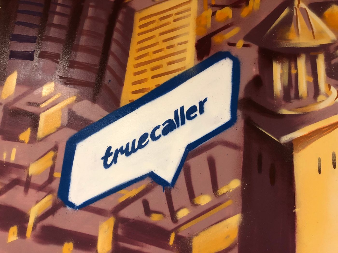 Truecaller — hand-painted mural by Spraya in Stockholm, Sweden