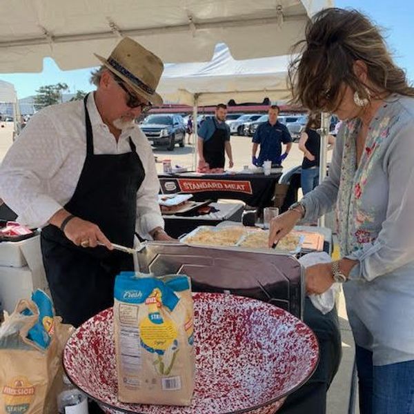 Scott Boleman of SMC cooks at Double Eagle Charities