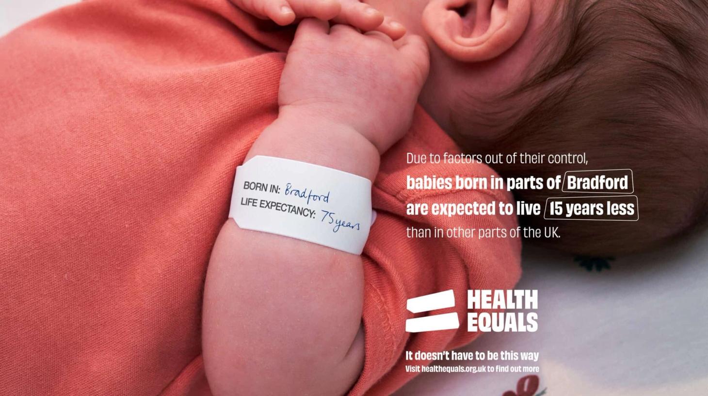 Image showing a newborn on a billboard, highlighting our charity and out-of-home advertising work