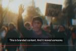 Blurry protest scene with raised hand and sign, captioned “This is branded content. And it moved someone.