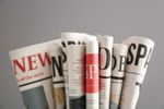 A collection of newspapers