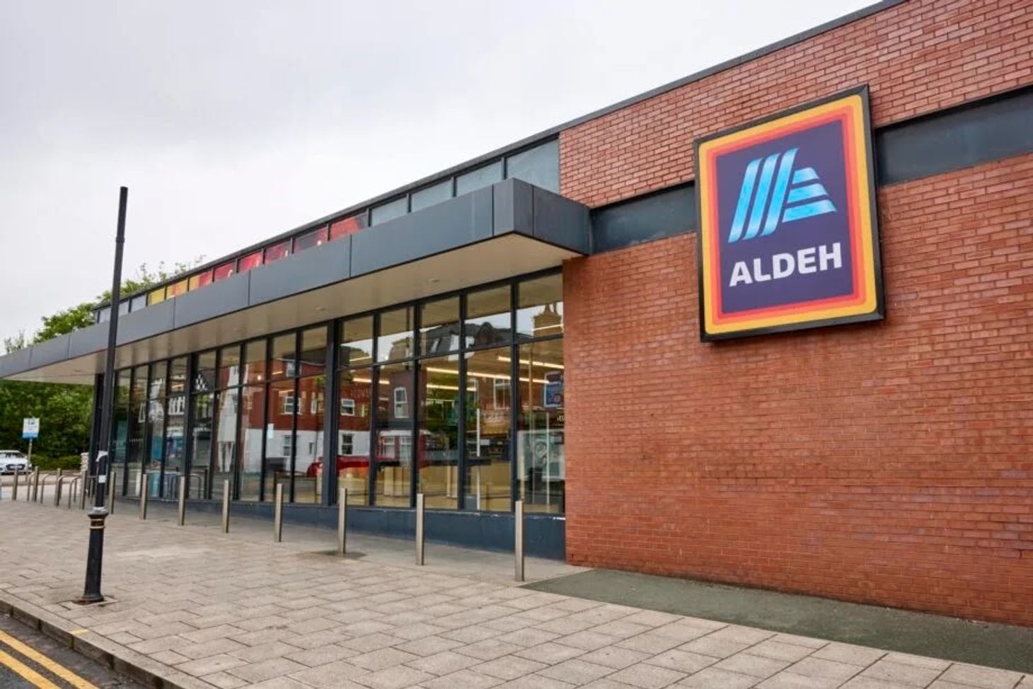 Aldi’s “Aldeh” sign on the wall outside a store, part of their Pretwich store’s celebration of the Oasis reunion gigs