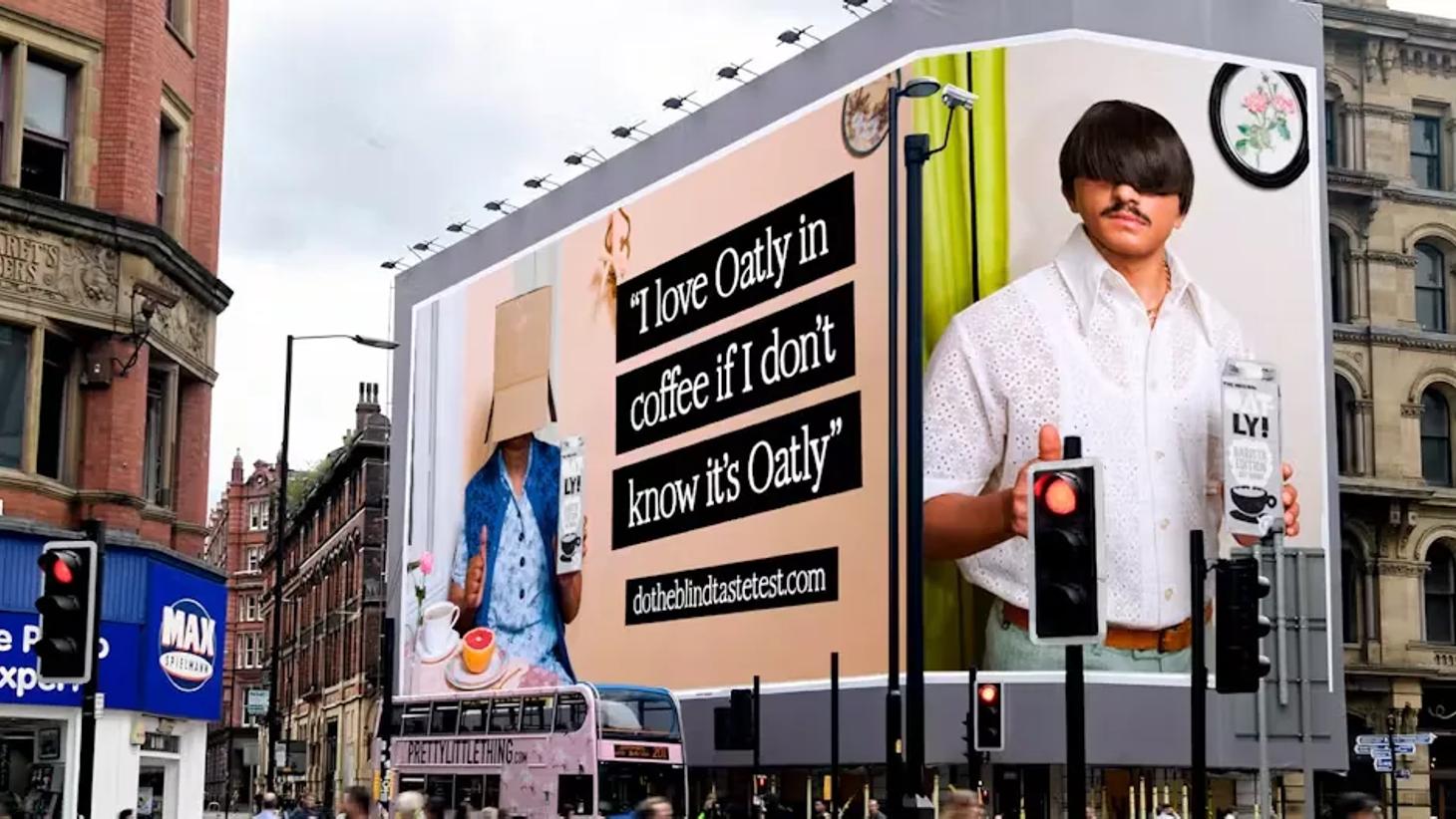 Oatly blind taste test billboard with a quote praising the oat milk in coffee from someone unaware it's Oatly