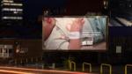 A powerful billboard from the Health Equals campaign displayed in Sheffield, featuring a poignant image of a newborn baby, highlighting successful hybrid marketing examples.