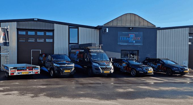 Front of the Fermé-Lux showroom in the Rolach industrial zone in Sandweiler, with the company vehicles