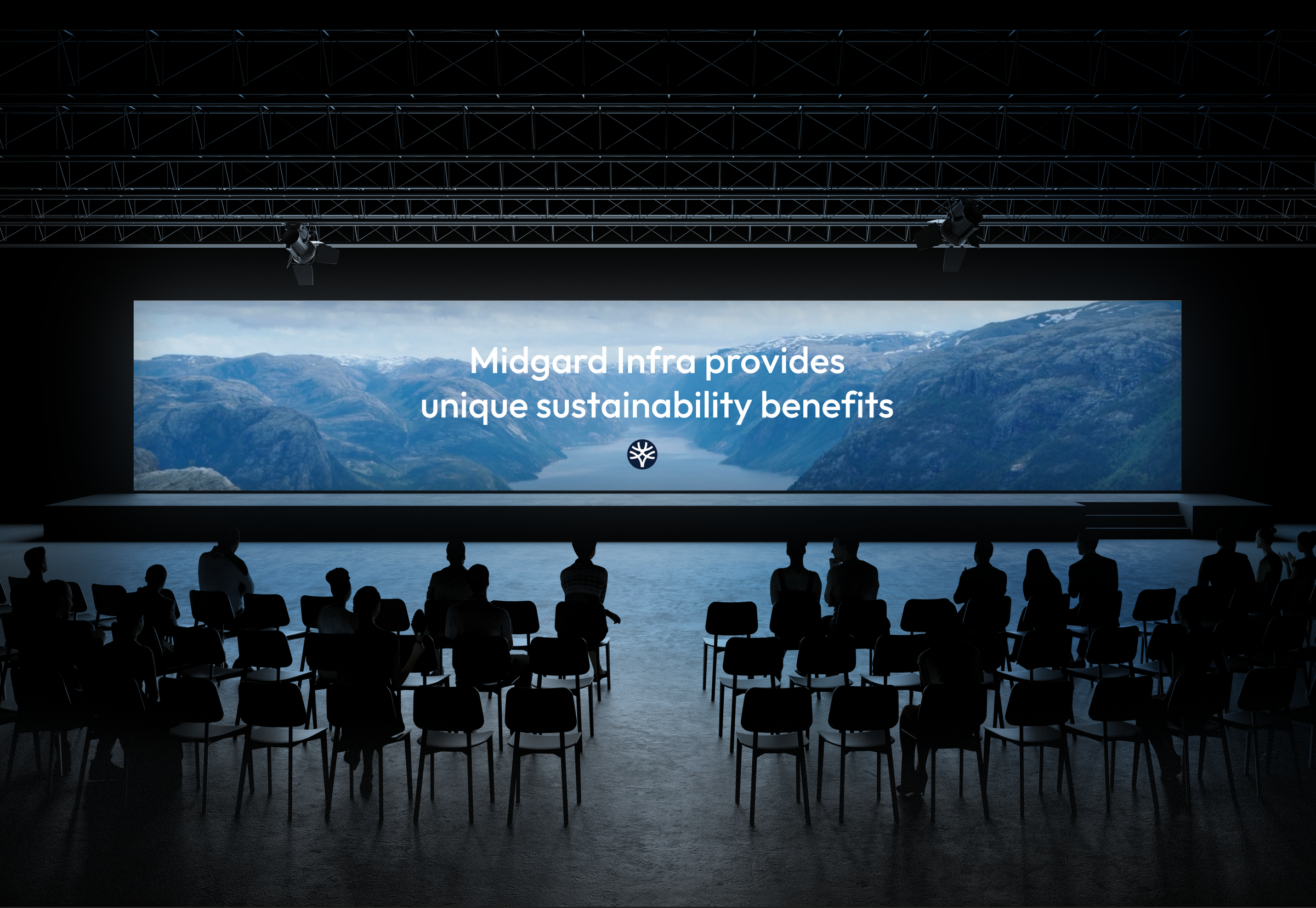 Bilde av en Midgard Infra presentasjon i en stor konferasehall.