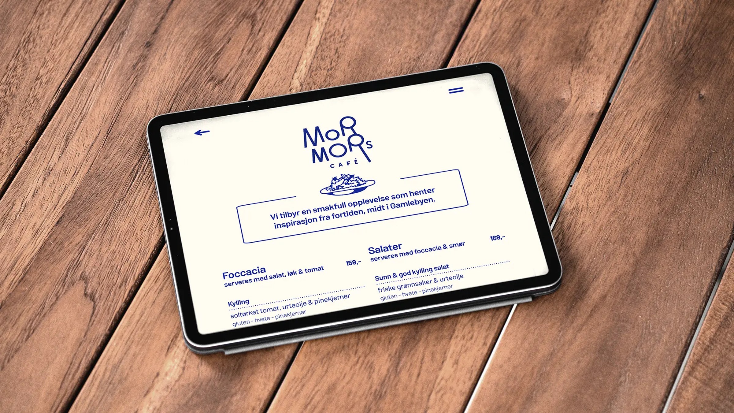 Bilde av en iPad med nettsiden til Mormors Cafe.