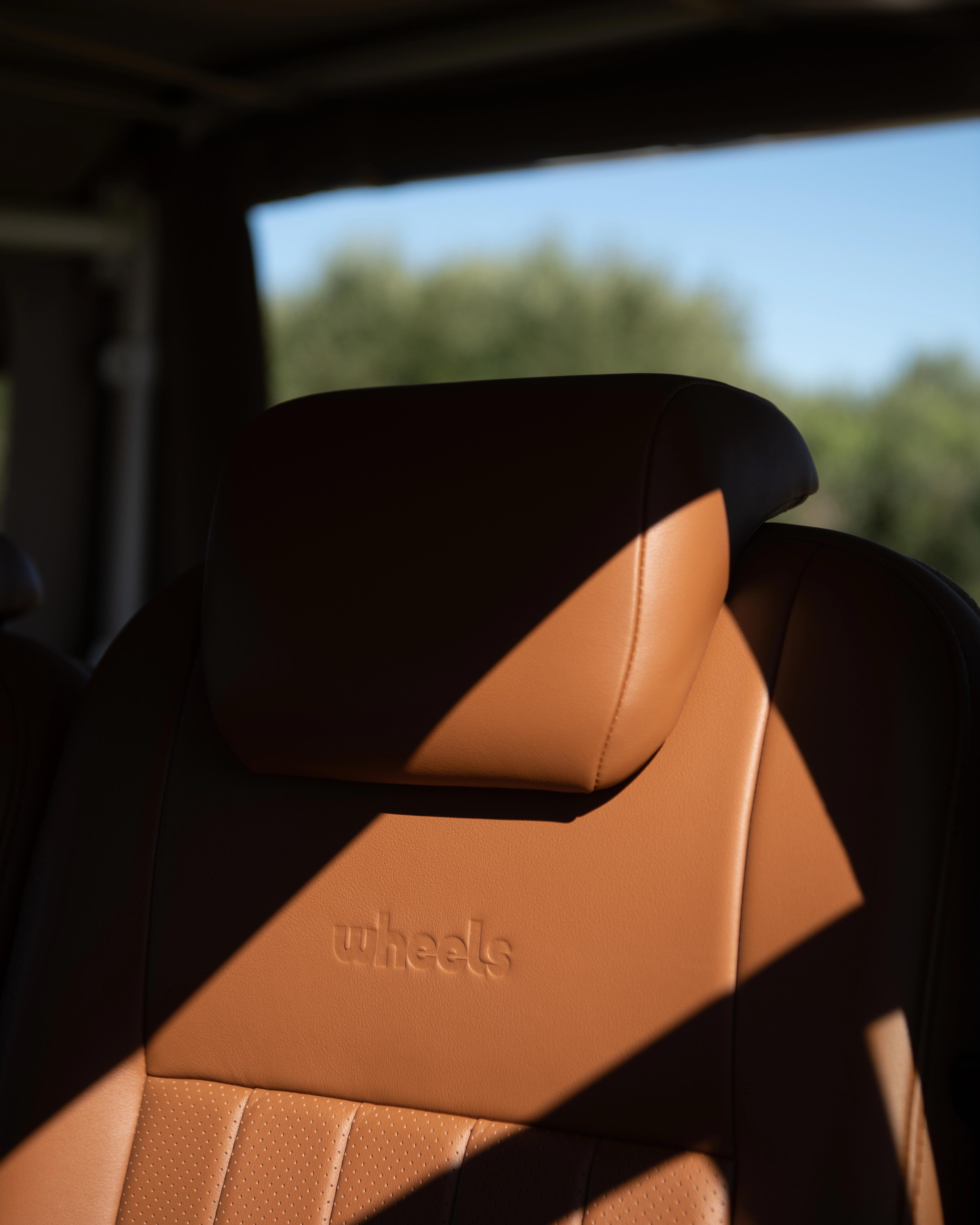 Full-grain tan leather interior.